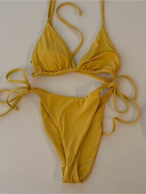 Dippin’ Daisy’s yellow bikini